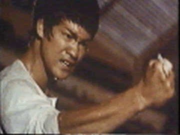 Bruce Lee gif photo: bruce lee BRUCEfist.gif